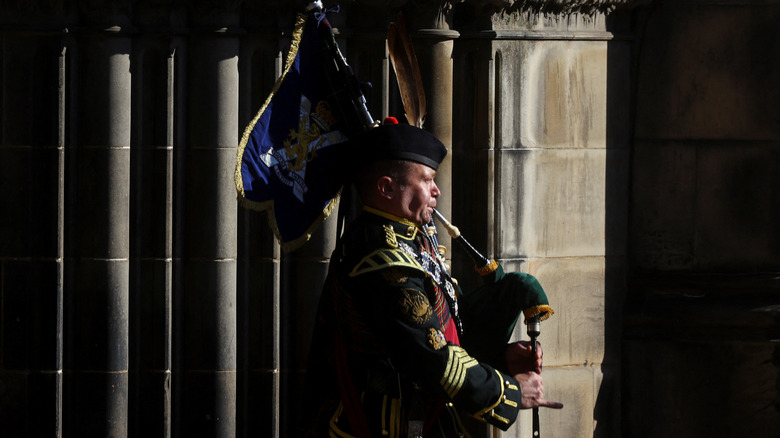 Royal piper playing the bagpipes