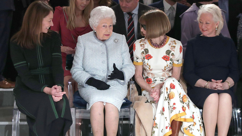 Queen Elizabeth II talking to Anna Wintour