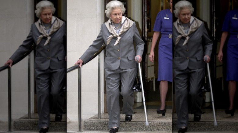 Queen Elizabeth II walking with cane