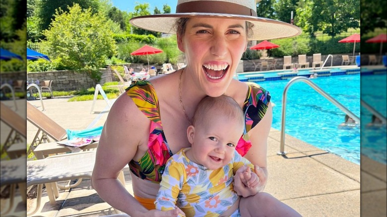 Missy Franklin holding her baby daughter 