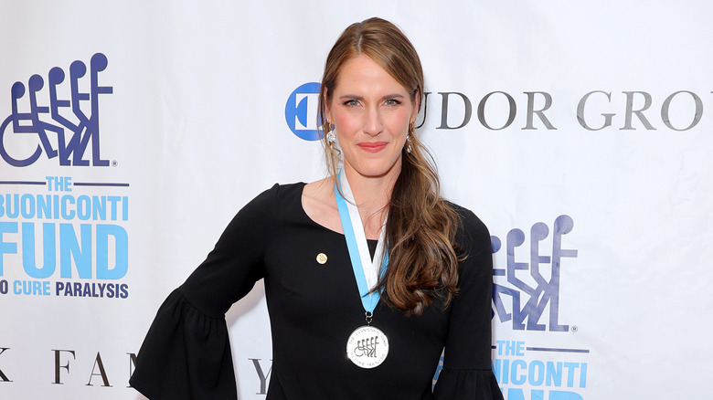 Missy Franklin posing with a medal 