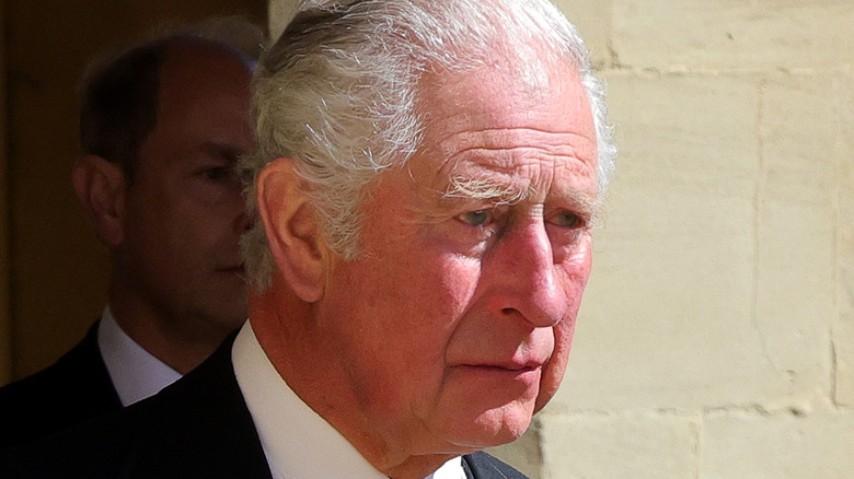 Prince Charles looking somber