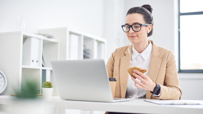 A woman working on a laptop