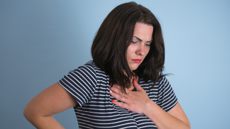 woman with lump in her throat emotional crying