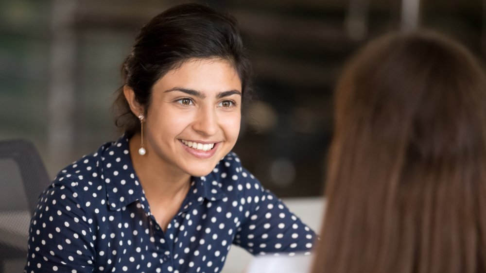 energetic woman smiling