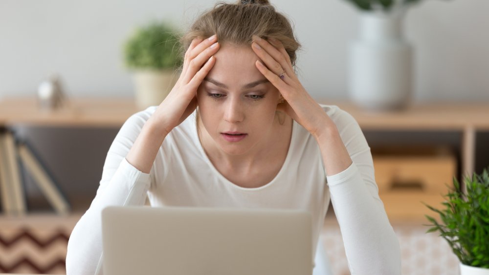 stressed woman at computer