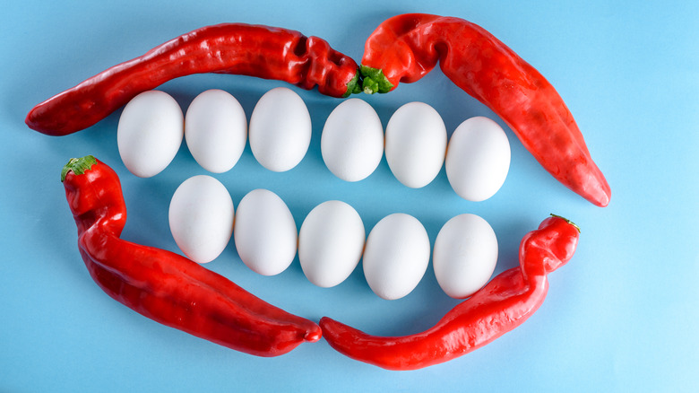 eggs and peppers arranged like teeth and lips