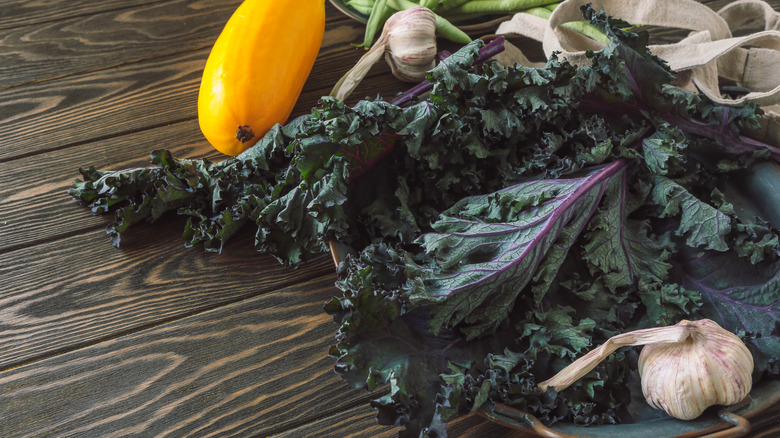 Kale and vegetables on a table