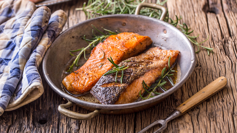Seared salmon in a pan