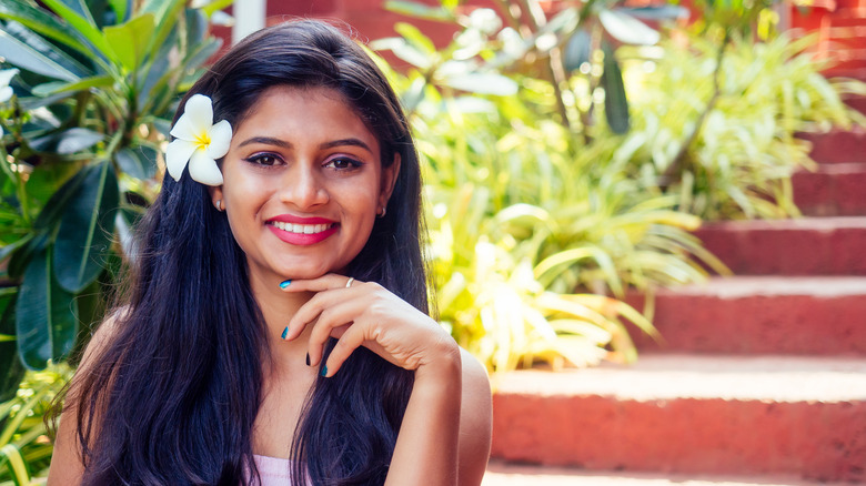 A woman with healthy hair and skin