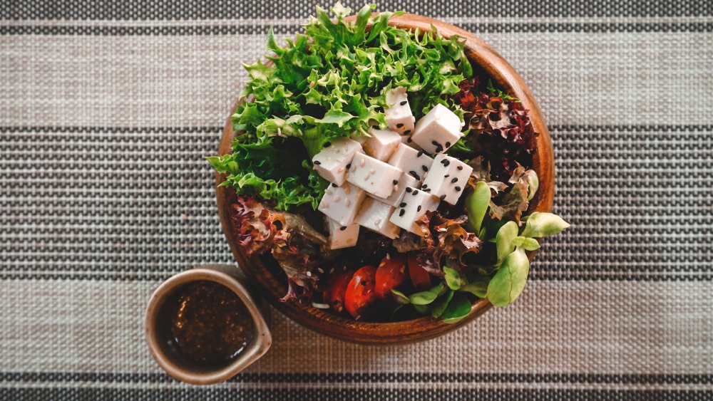 Tofu salad in a bowl with sauce