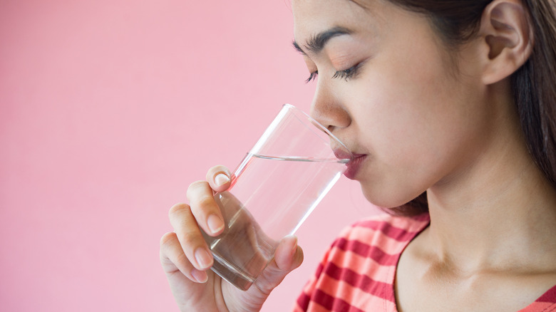 A woman drinking water