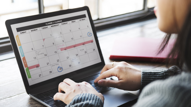 A woman planning her calendar