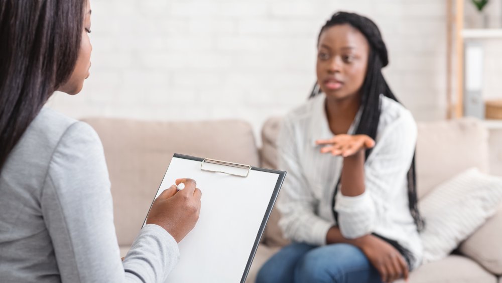 A woman talking to her psychologist