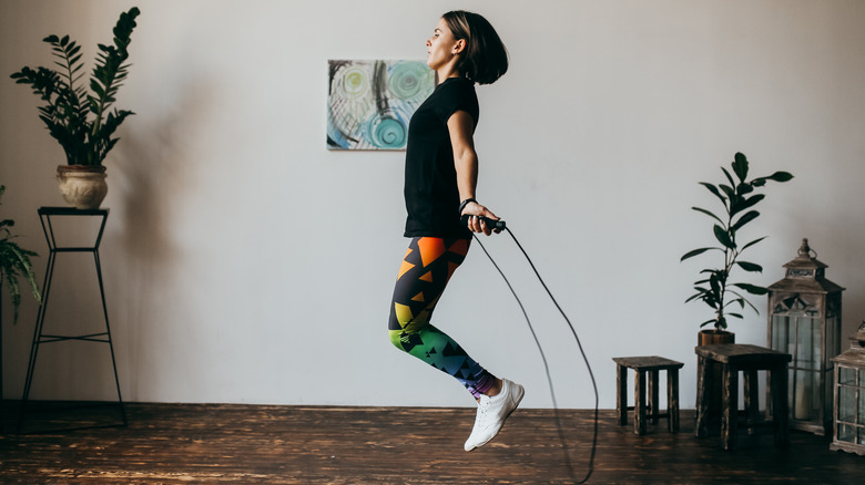 Woman using jump rope