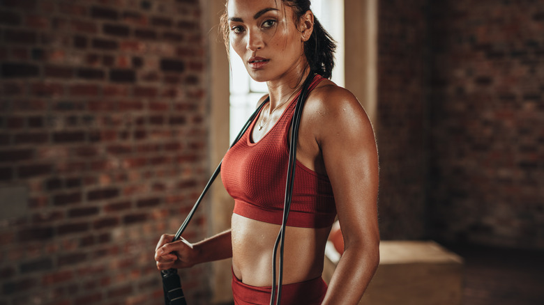 Woman posing with jump rope