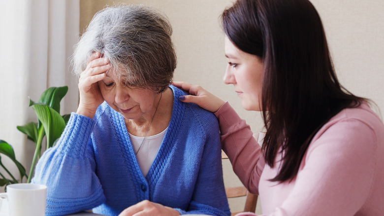 woman consoles older woman