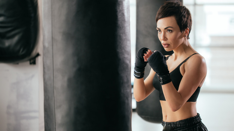 A woman preparing to punch