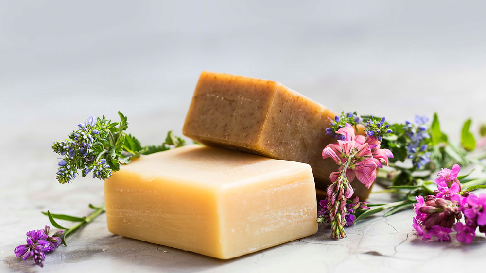 Bar soap surrounded by flowers