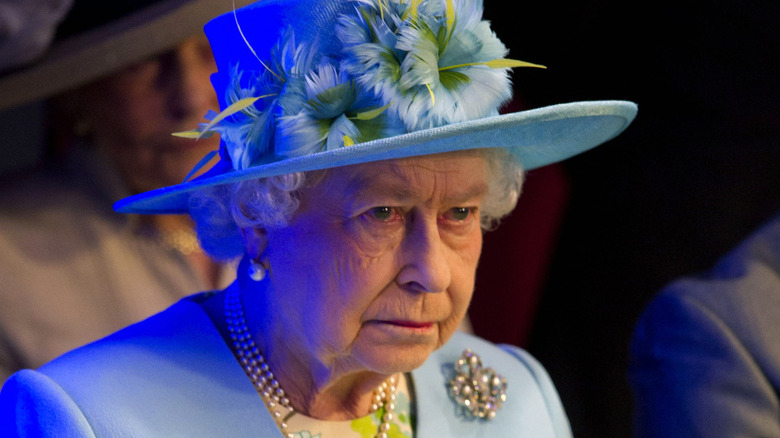 the queen looking sad 
