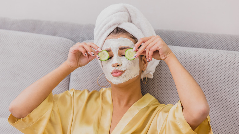 Woman using a skincare mask