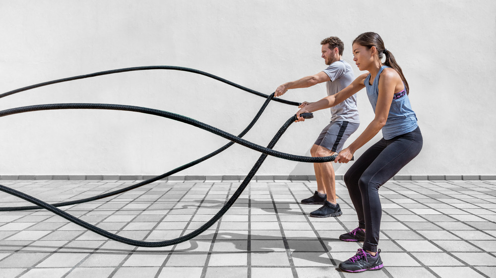 Man and woman working out