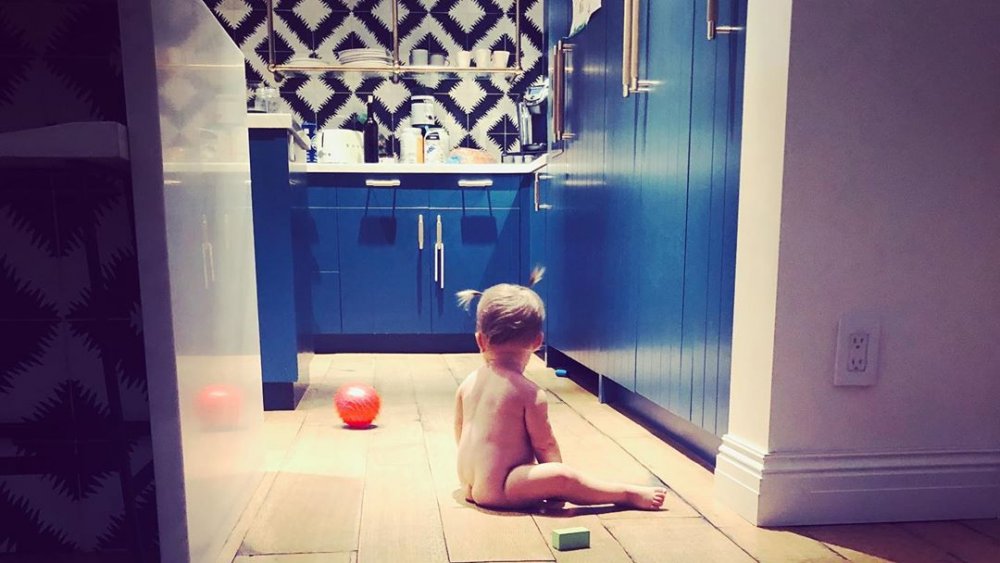 The kitchen in Hilary Duff's home, with baby