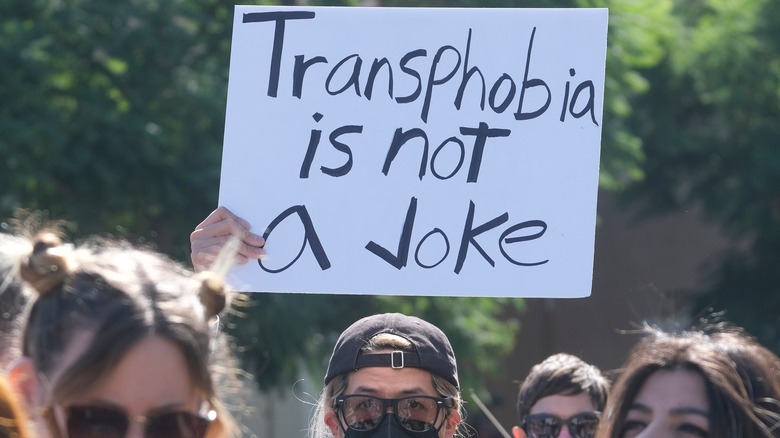 Protestor holding a sign 