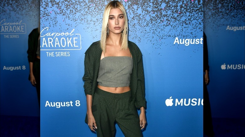 Hailey Bieber poses