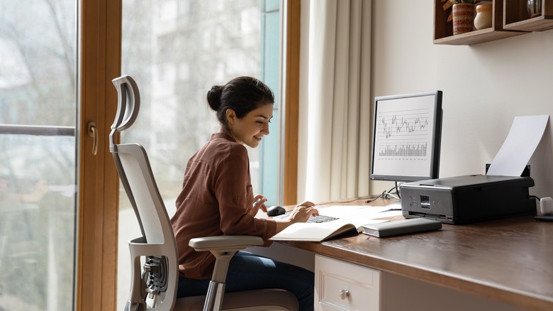 Woman sitting at desk 