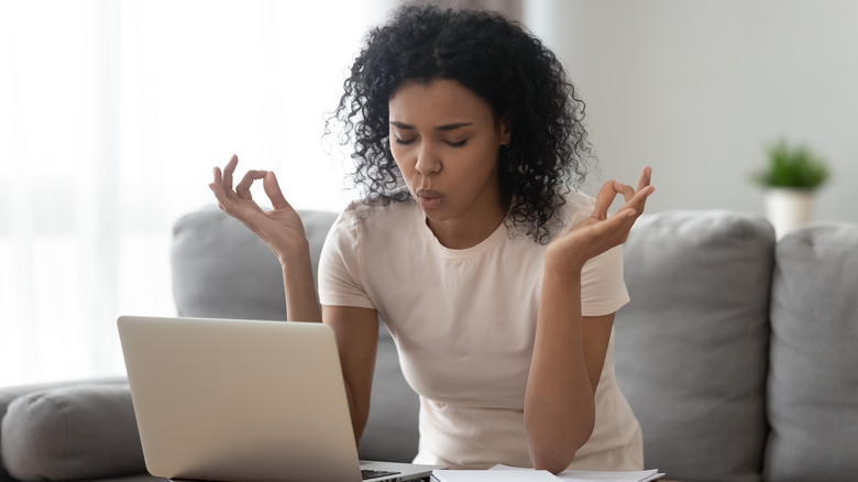 Woman performing eye yoga exercises