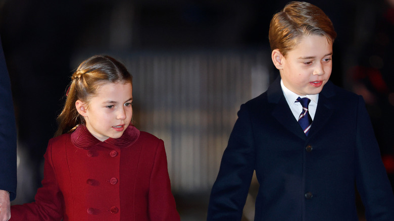 Prince George and Princess Charlotte walking