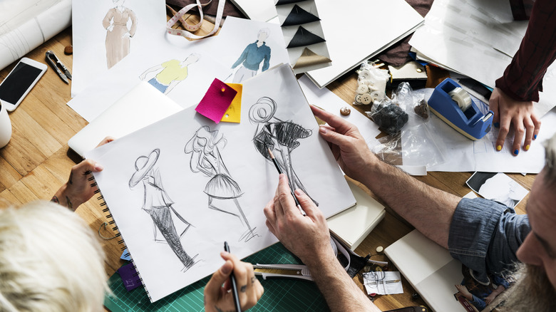 Fashion designers making sketches 