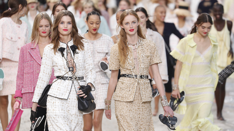 Chanel models walking on runway