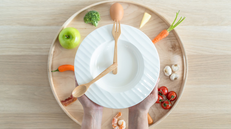 Food arranged as clock