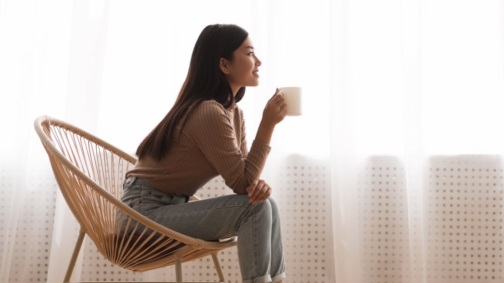 Woman enjoying a cup of coffee