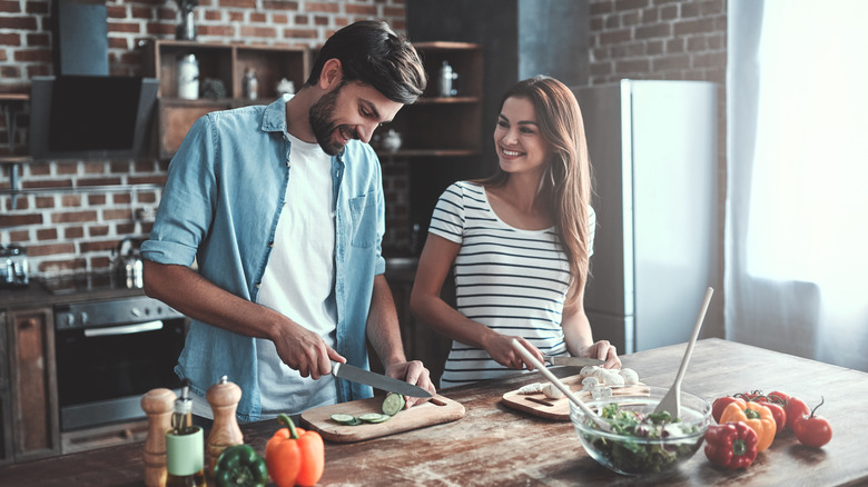 Couple cooking together