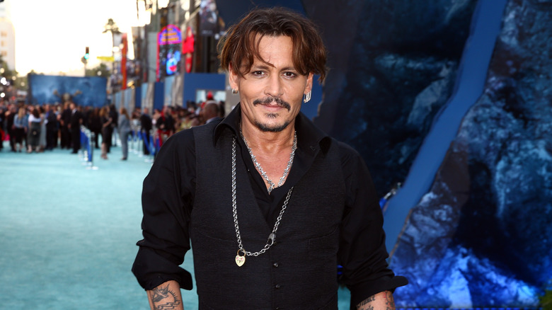 Johnny Depp poses for a photo 