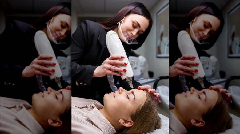 Woman getting laser treatment