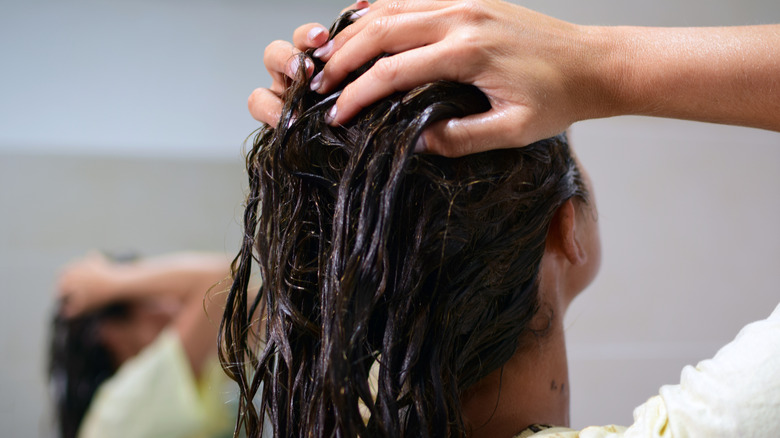 A woman washing her hair