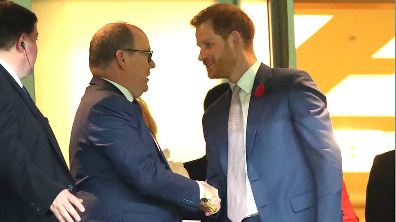 Albert and Harry shaking hands in 2019 