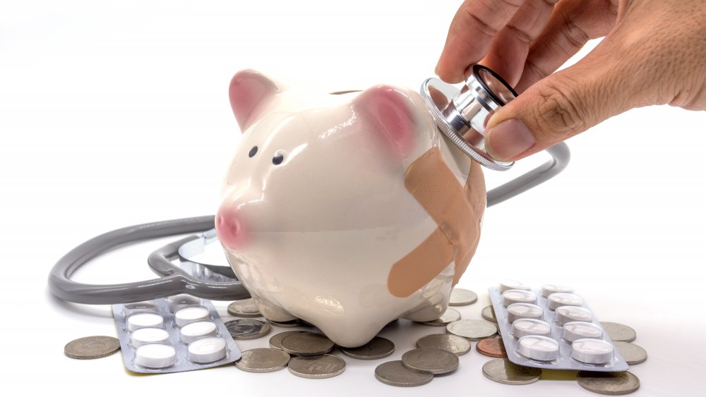 Cost of healthcare - stethoscope and piggy bank