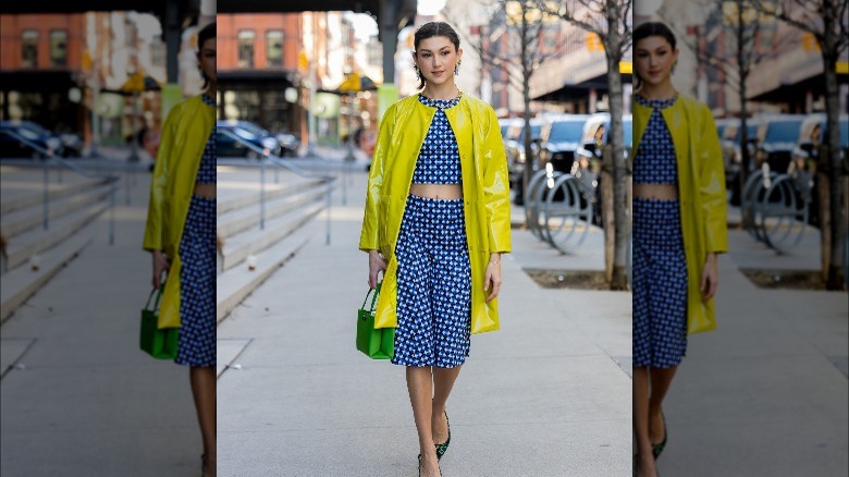 Woman wearing bright stylish outfit