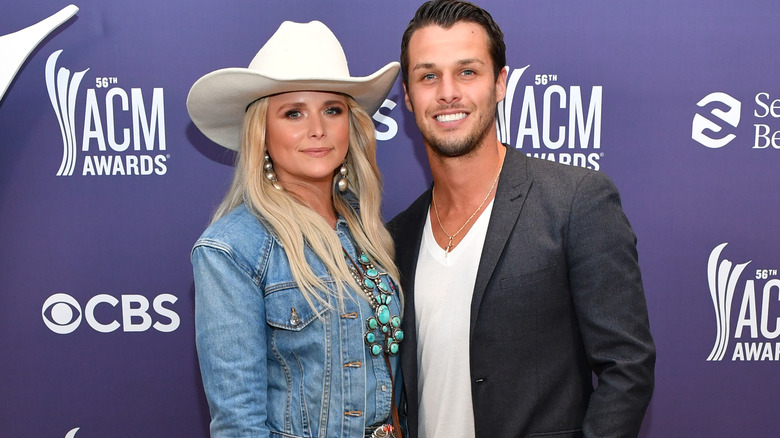 Miranda Lambert in cowboy hat and Brendan McLoughlin smiling