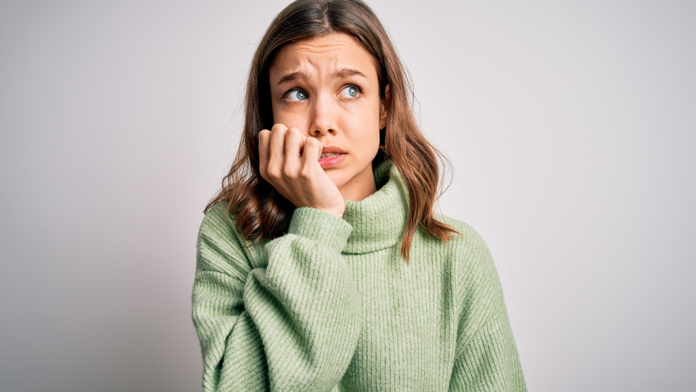 Woman looking anxious