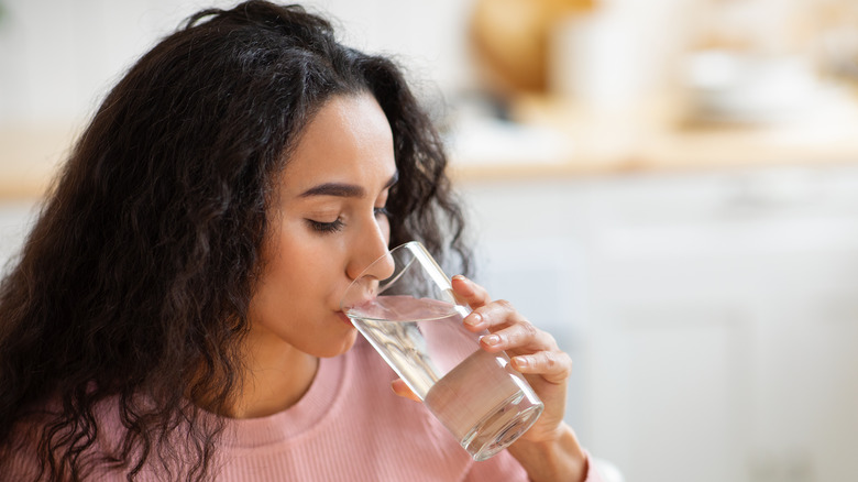 Woman drinking a glass of water