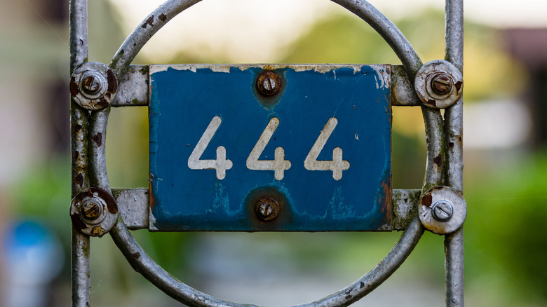 Number 444 on old fence 