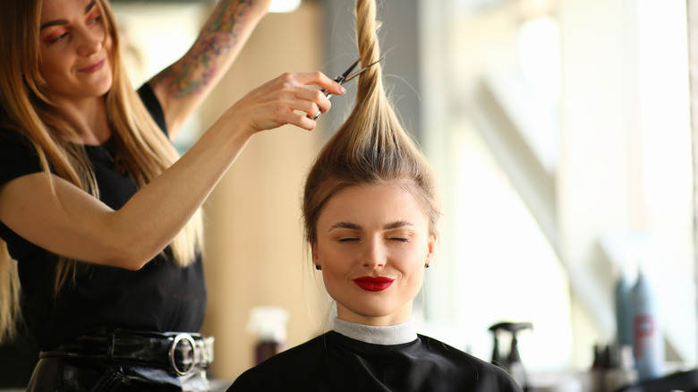 a woman haircut getting a haircut