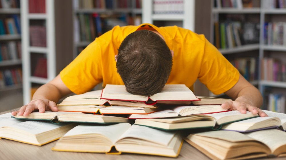 Student falling asleep while studying