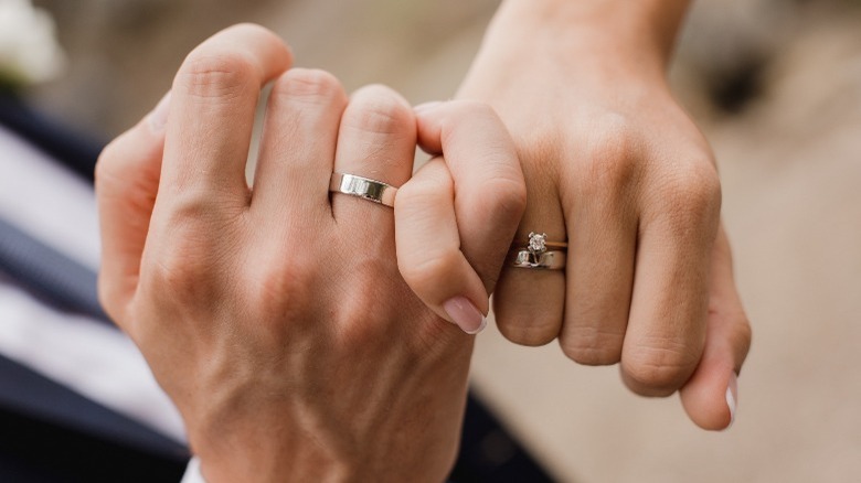 couple commitment wedding rings